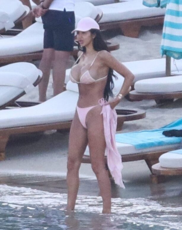 Chloe Khan - In a pink bikini with a mystery man on holiday in Mykonos