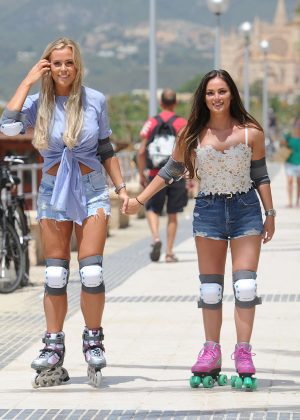 Chloe Meadows and Courtney Green Rollerblading on the beach in Majorca