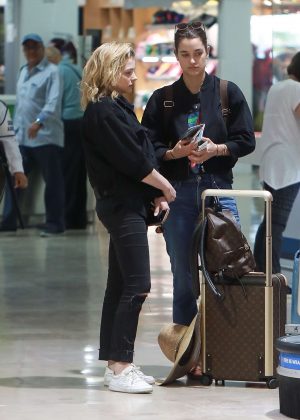 Chloe Moretz and Kate Harrison at an airport in Puerto Vallarta