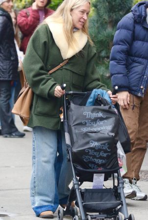 Chloe Sevigny - Seen make-up-free during a stroll with her son in Manhattan’s SoHo area