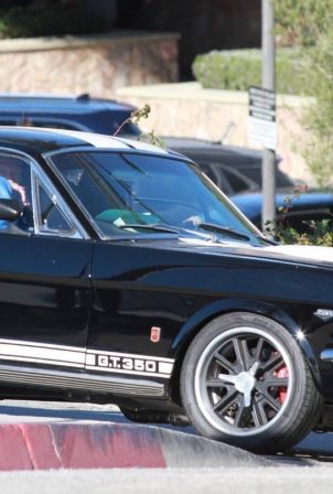Chris Martin and Dakota Johnson - take her classic Mustang on a coffee run in Malibu