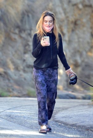 Chrishell Stause - Withe her dog Gracie on a morning walk in Hollywood Hills