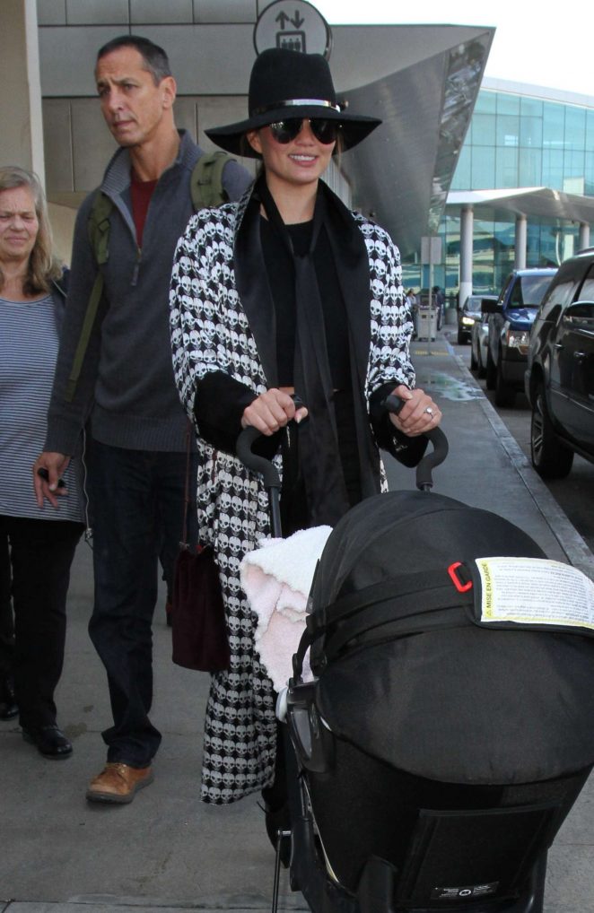 Chrissy Teigen - Arrives at LAX Airport in LA