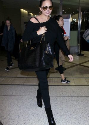 Chrissy Teigen - Arrives at LAX Airport in Los Angeles