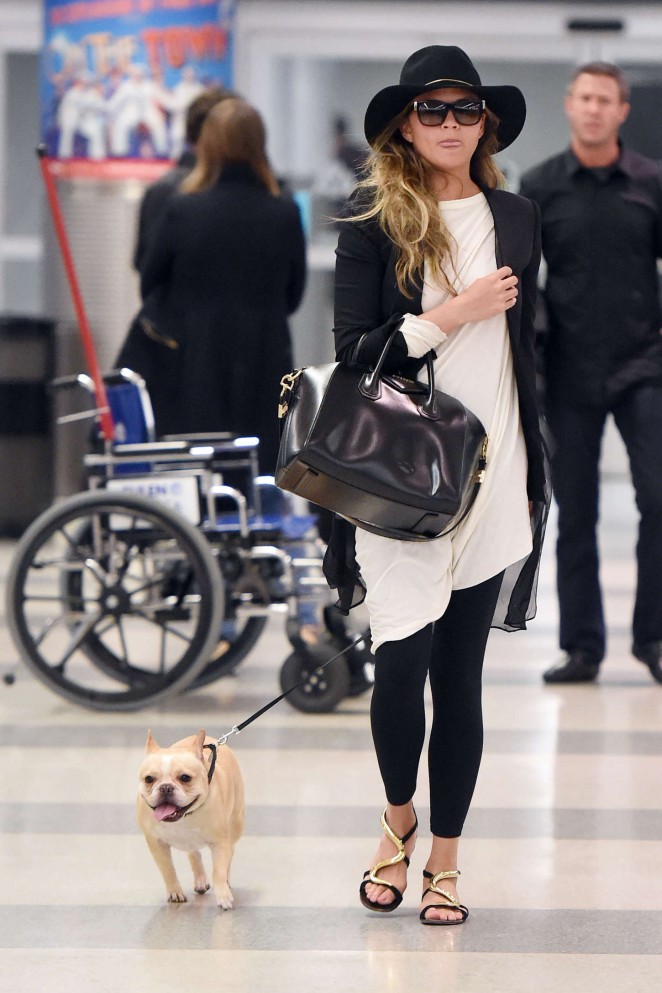 Chrissy Teigen - Arriving at JFK Airport in NYC