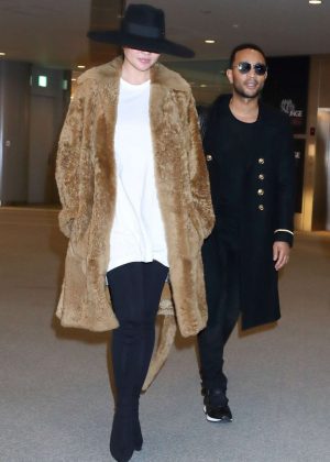 Chrissy Teigen in Fur Coat at Narita International Airport in Tokyo
