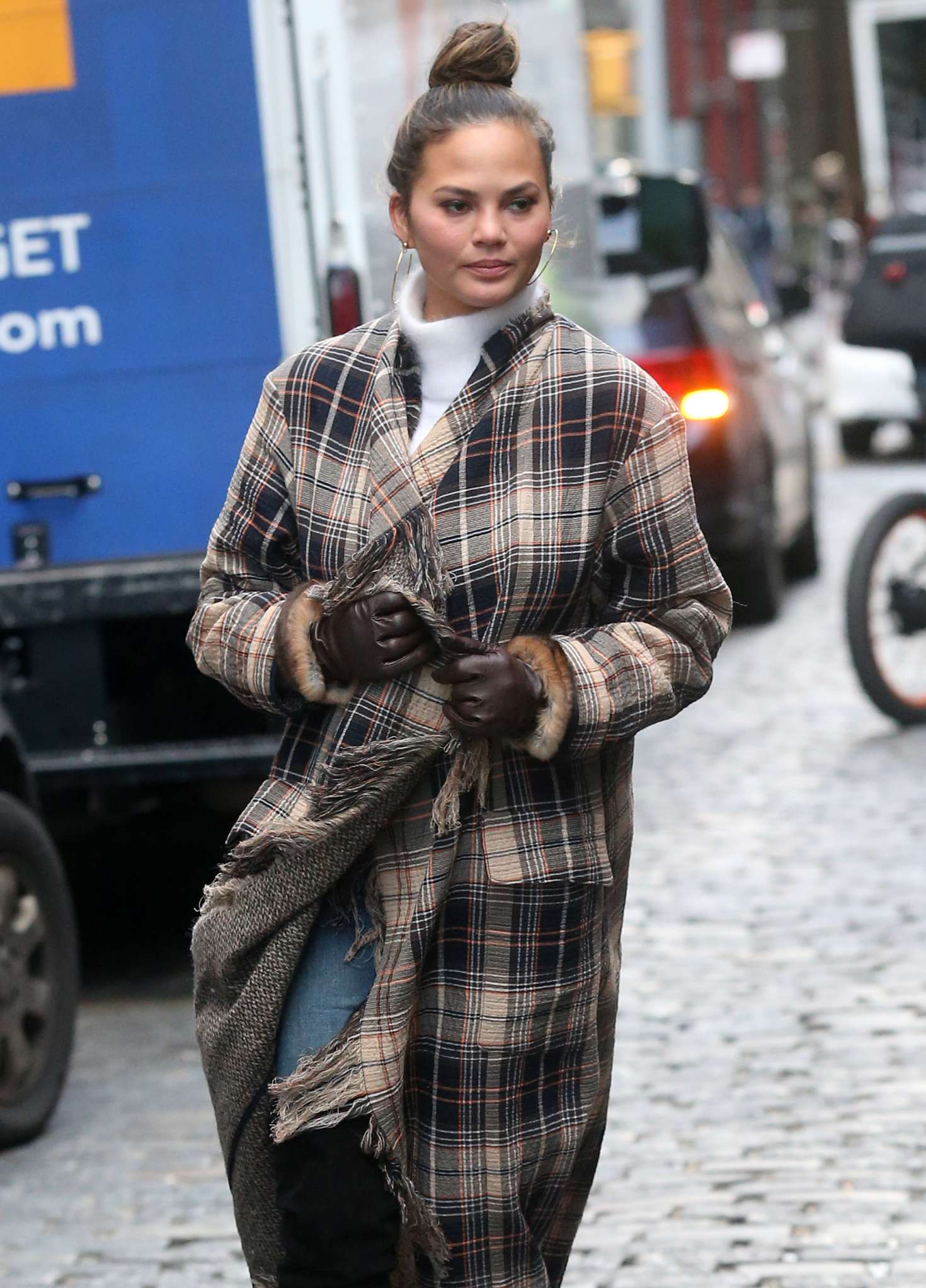 Chrissy Teigen in Long Coat out in New York
