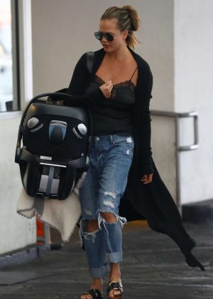 Chrissy Teigen in Ripped Jeans - Out in Los Angeles