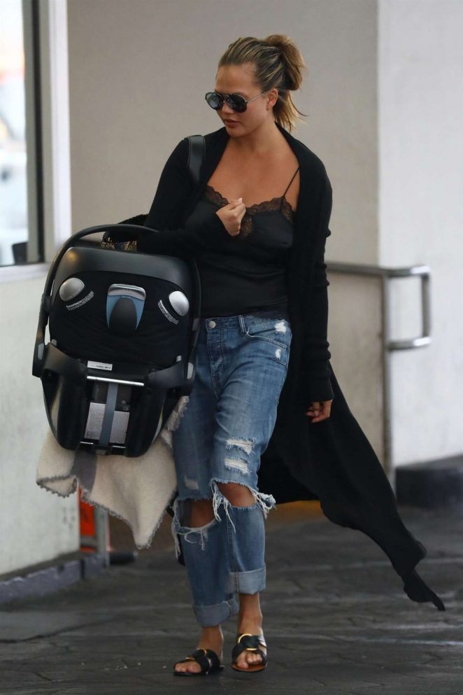 Chrissy Teigen in Ripped Jeans - Out in Los Angeles
