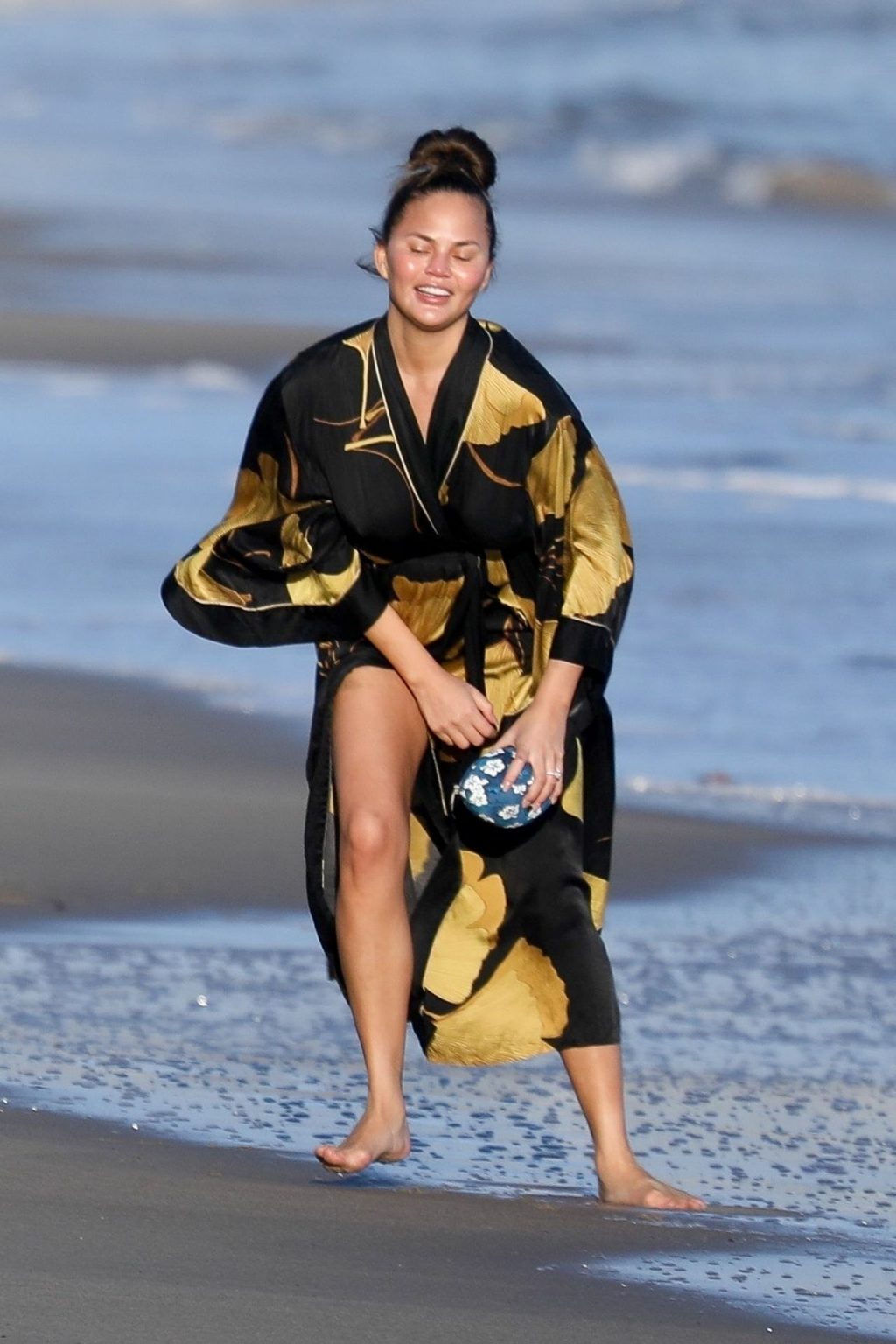 Chrissy Teigen Seen On Beach In Malibu