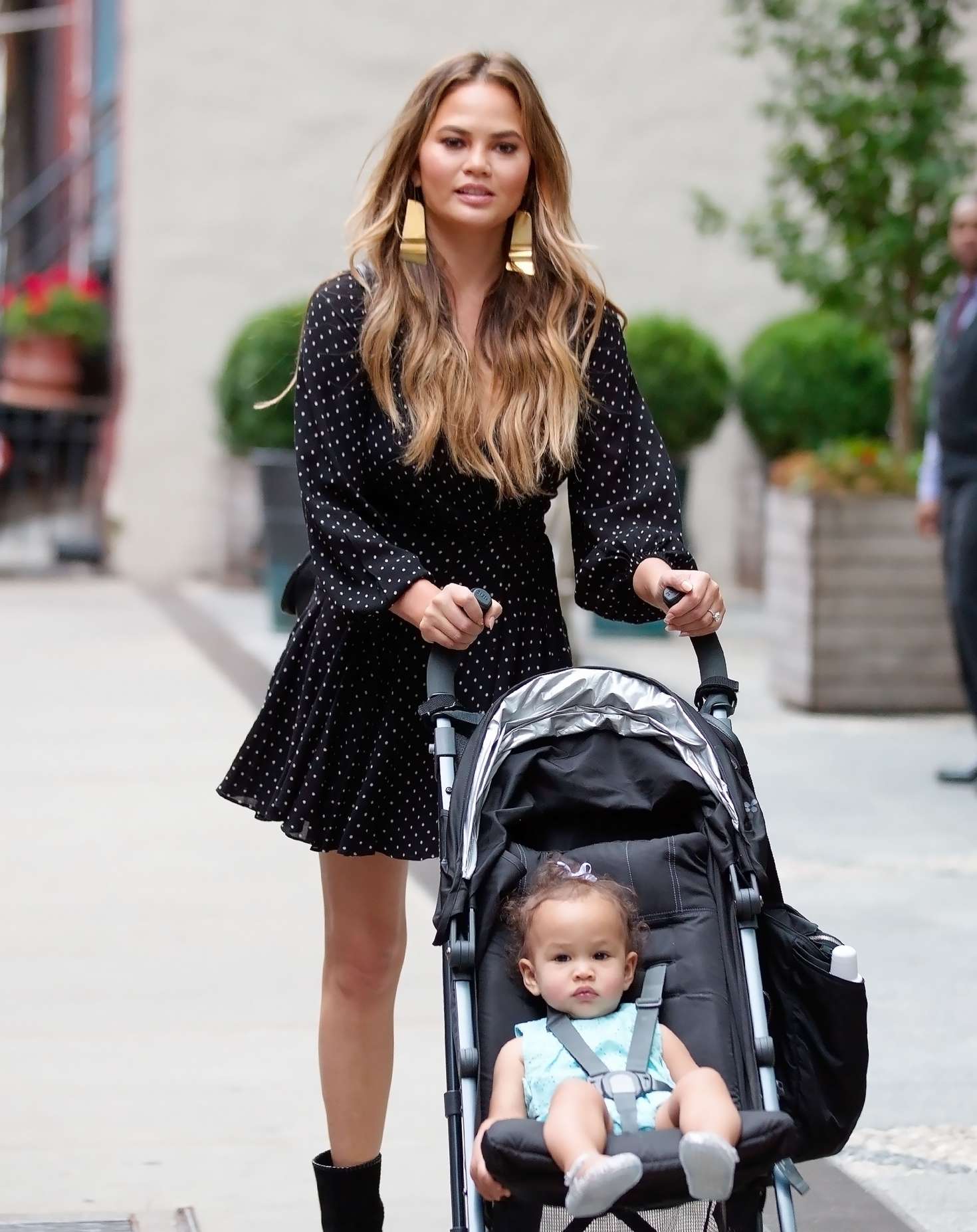 Chrissy Teigen - Takes baby Luna for a stroll in New York