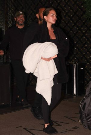 Chrissy Teigen - With John Legend check out of their New York hotel