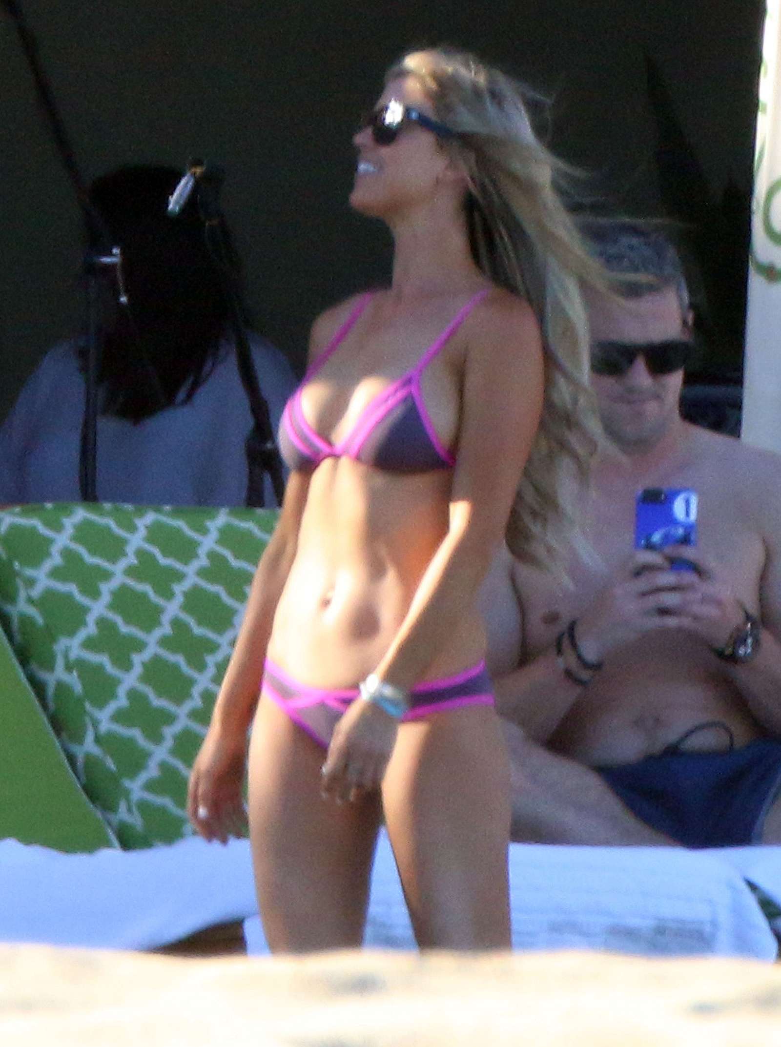 Christina El Moussa in Purple Bikini on the pool in Cabo San Lucas. 