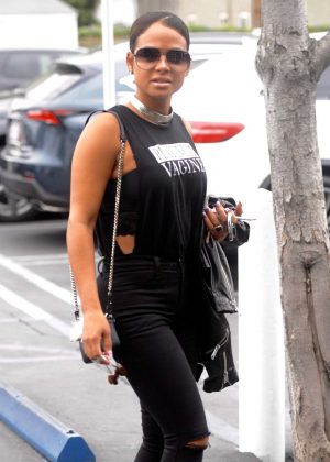 Christina Milian in Black Ripped Jeans Out in Los Angeles