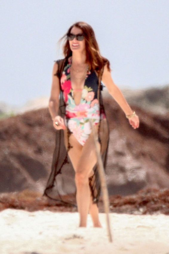 Christina Pascucci in Floral Swimsuit on the beach in Tulum
