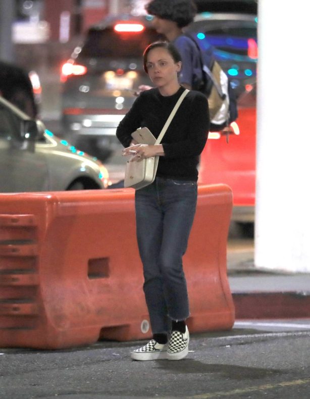 Christina Ricci - Photographed with her family at LAX