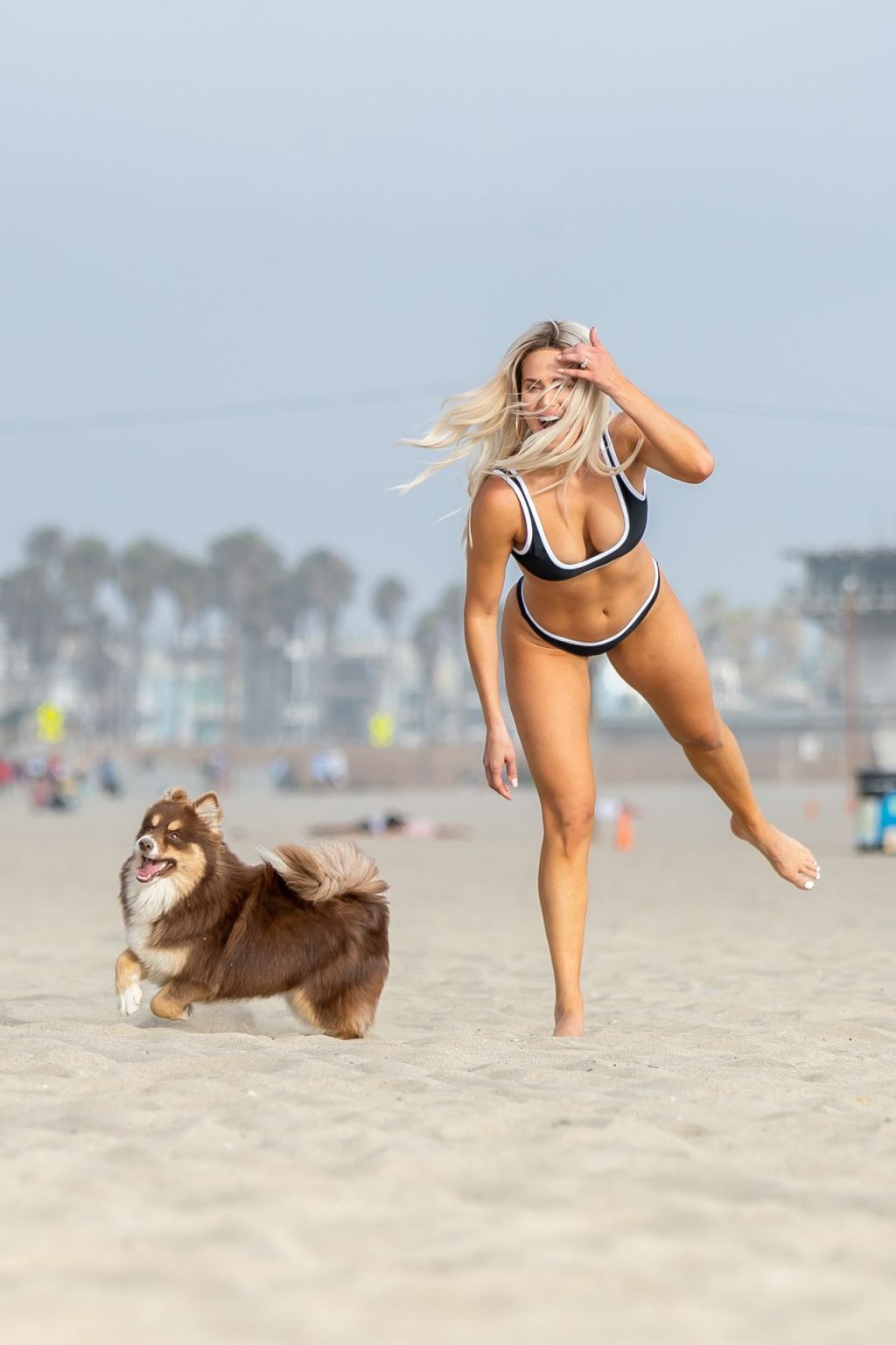 CJ Lana Perry in Bikini playing with her dog at Venice Beach. 