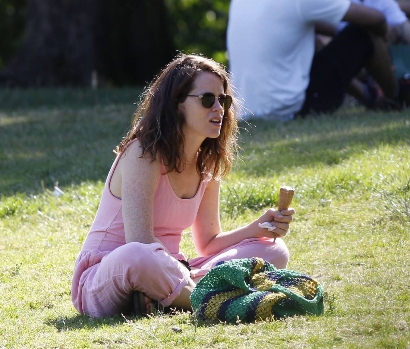 Claire Foy - meeting with a friend in a London park. 