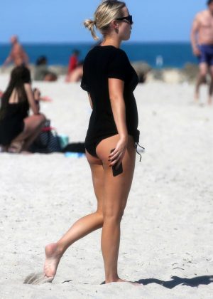 Claire Holt in Bikini Bottoms on the beach in Miami