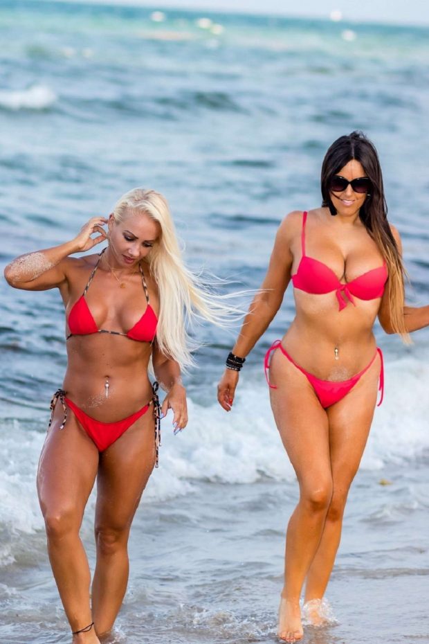 Claudi Romani and Daisy Jae in Red Bikini on the beach in South Beach