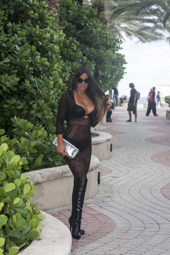 Claudia Romani in a mesh dress in Miami