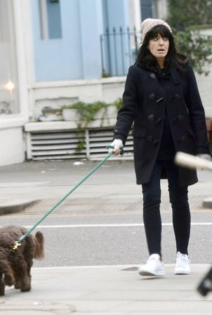 Claudia Winkleman - Takes her pet pooch out for a walk with a friend in London