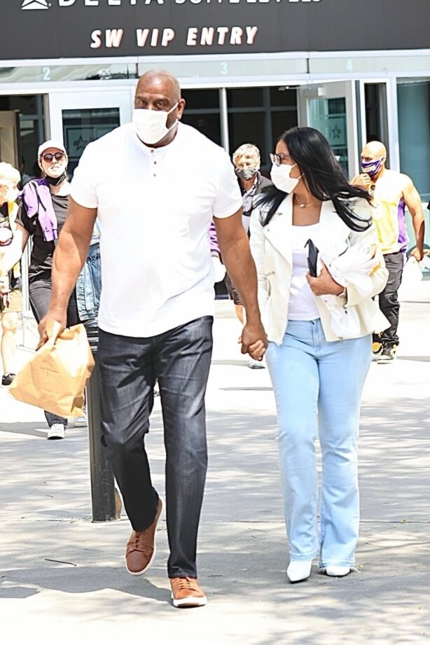 Cookie Johnson - Leaving the Lakers vs Suns basketball game in Los Angeles
