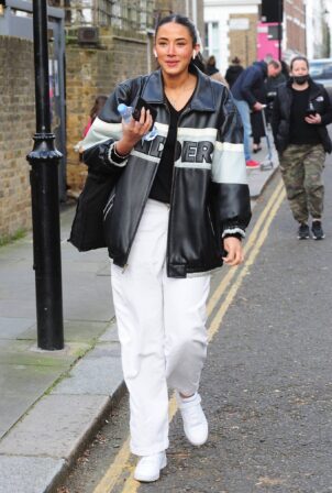 Cora Corre - In an oversized leather jacket while stepping out in London