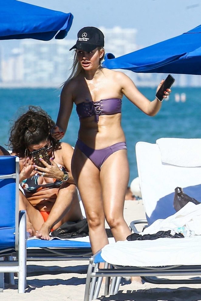 Corinne Olympios in Purple Bikini on the beach in Miami
