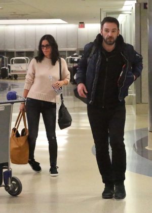 Courteney Cox and fiancee Johnny McDaid at LAX Airport in LA