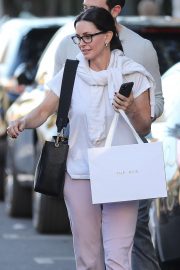 Courteney Cox in Pink Sweatpants - Shopping on Melrose Place in West Hollywood