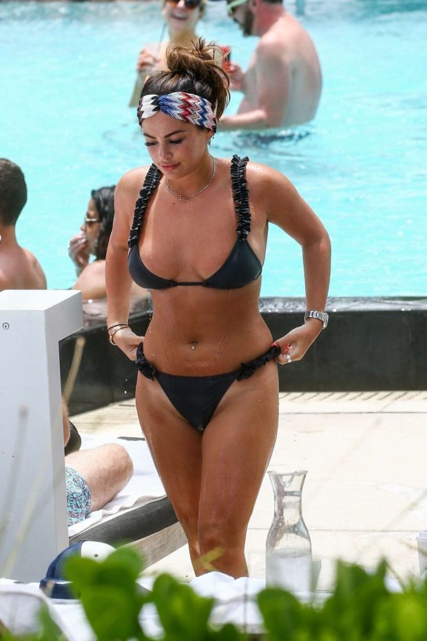 Courtney Green in Black Bikini on the pool in Miami