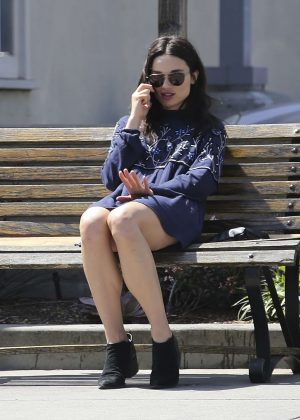 Crystal Reed on a bench in LA