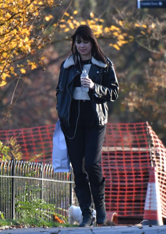 Daisy Lowe at  Regent's Park with her dog in London