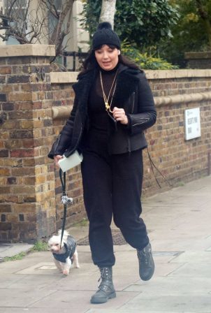 Daisy Lowe - Took her cute pet dog for a walk in North London