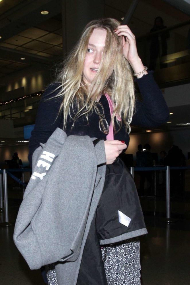 Dakota Fanning - Arrives at LAX Airport in LA