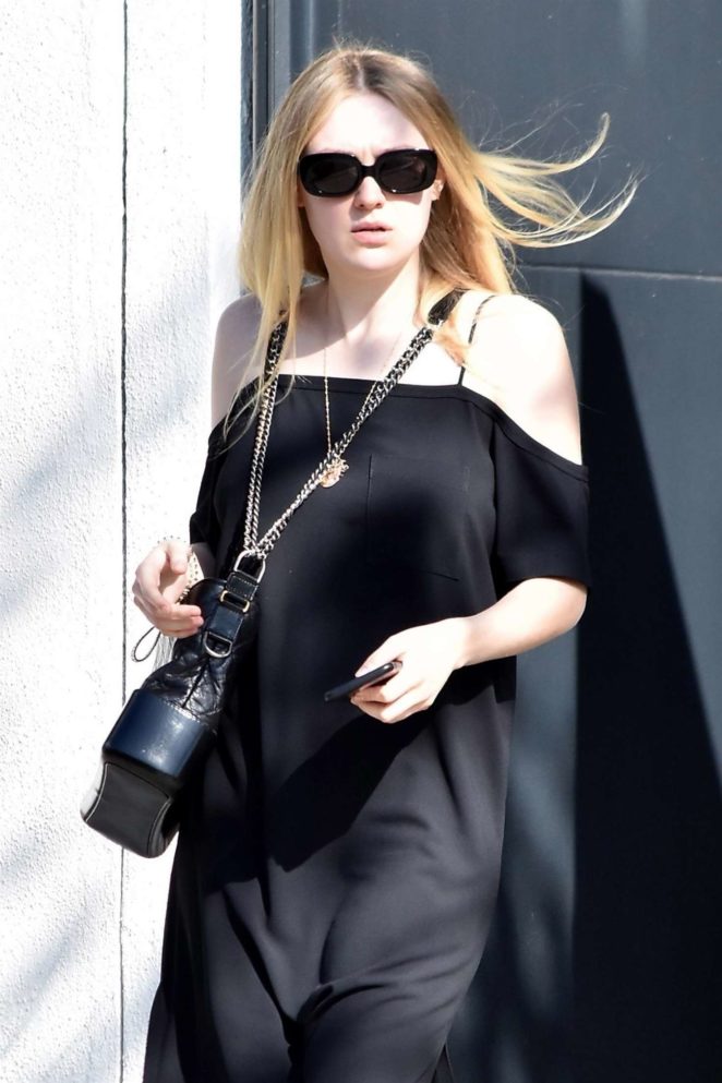 Dakota Fanning in Black Dress at Nine Zero One salon in West Hollywood