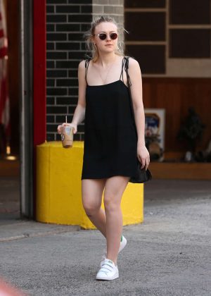 Dakota Fanning in Black Mini Dress out in New York