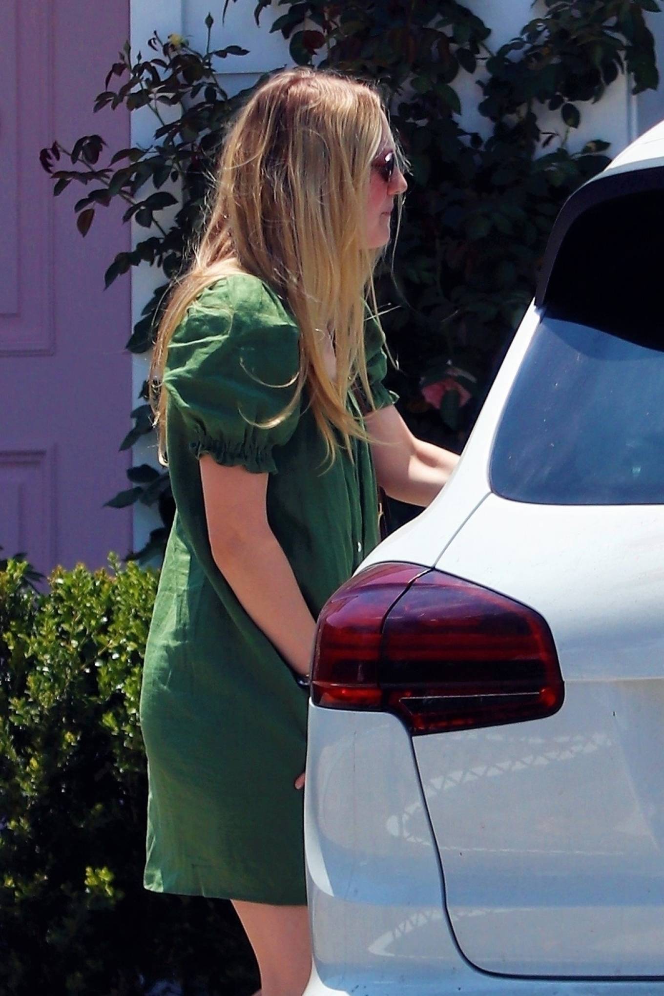 Dakota Fanning in Green Mini Dress – Out in LA