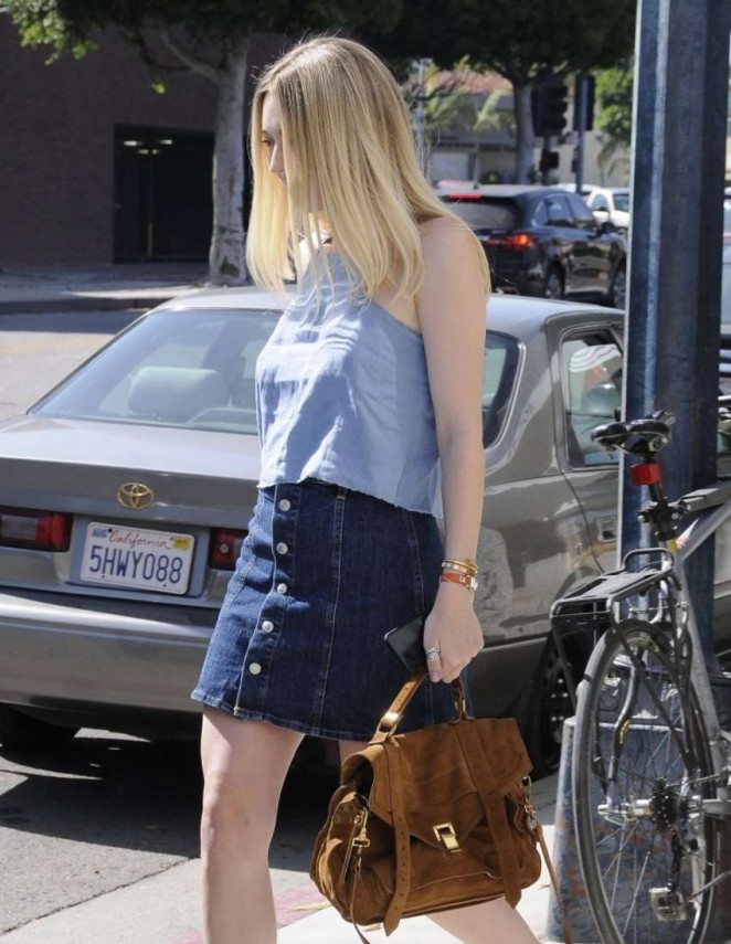 Dakota Fanning in Jeans Skirt out in Beverly Hills