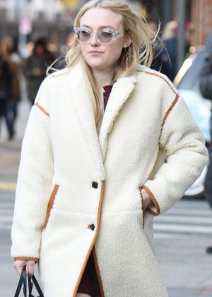 Dakota Fanning in White Coat - Out in NYC