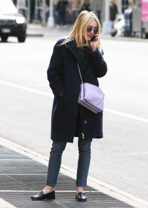 Dakota Fanning in Black Coat Out in NYC