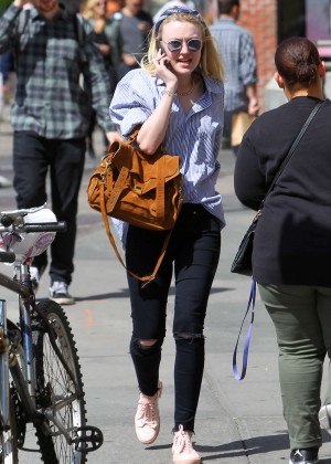 Dakota Fanning in Ripped Jeans Out in NYC