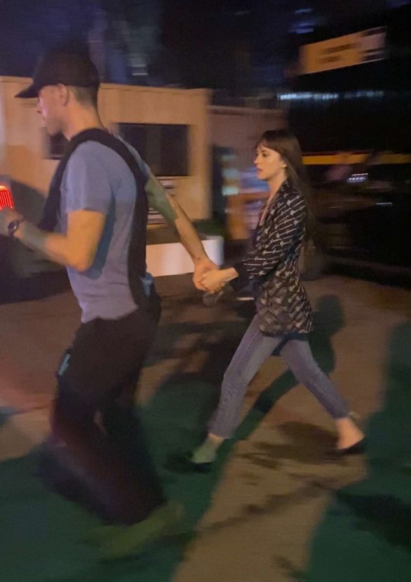 Dakota Johnson and Chris Martin - Exiting the Global Citizen Festival in NYC
