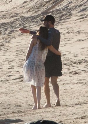 Dakota Johnson and Chris Martin on the beach in Malibu