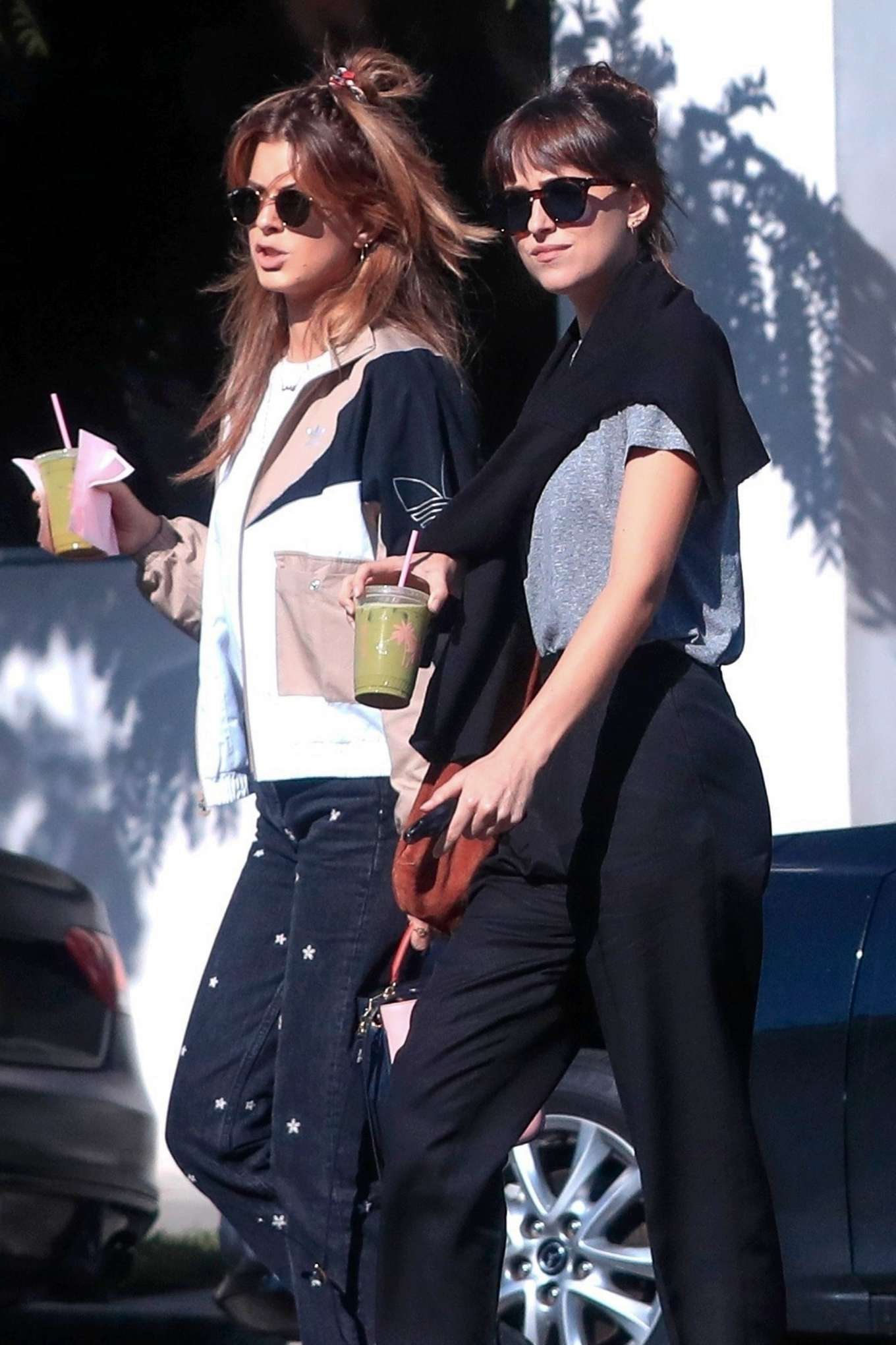 Dakota Johnson and her friend at Cha Cha Matcha in West Hollywood