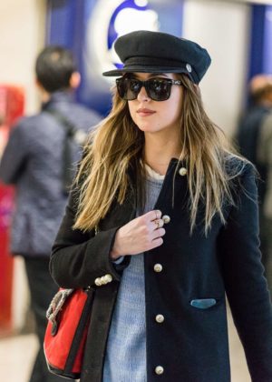Dakota Johnson - Arrives at Heathrow Airport in London