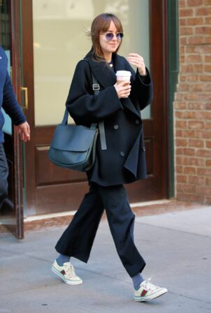 Dakota Johnson - Heads out in Gucci sneakers in New York City