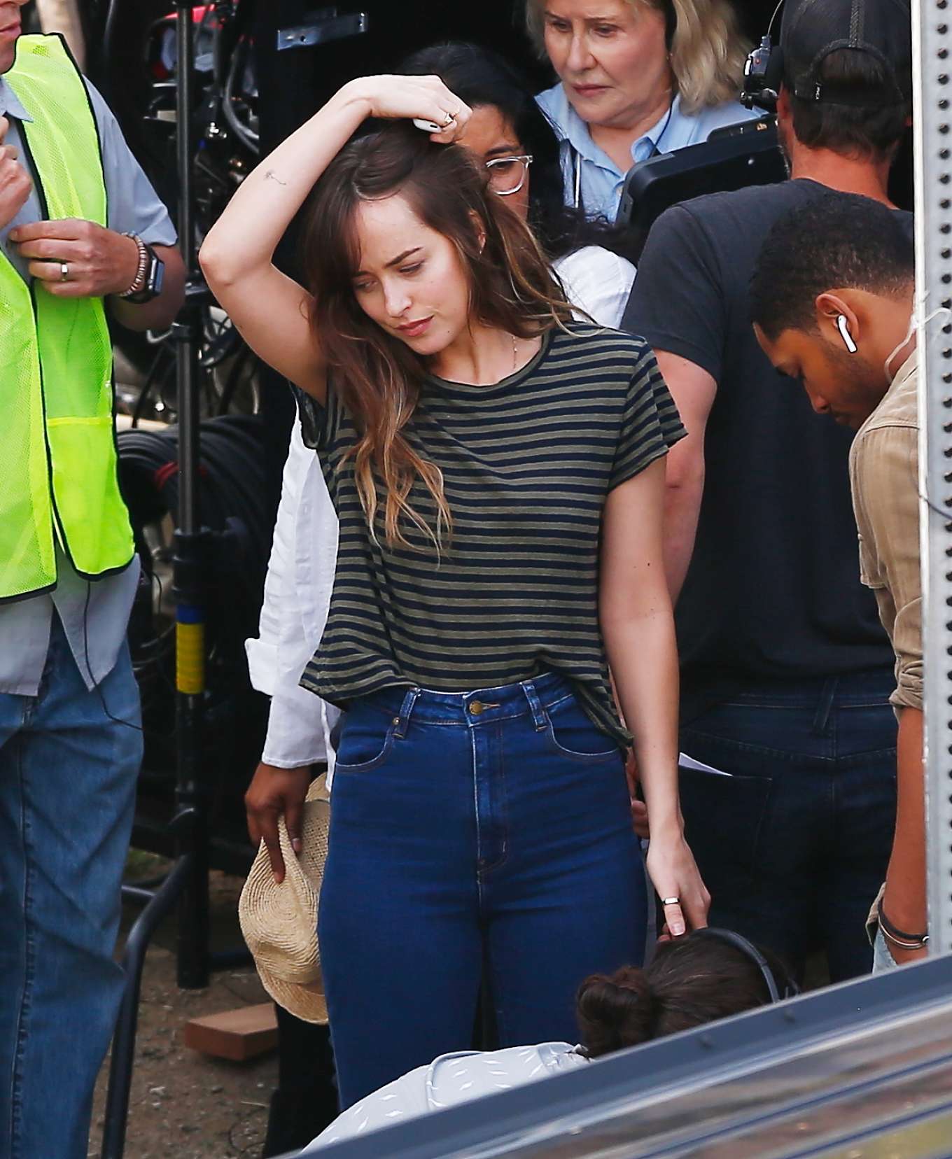Dakota Johnson in Ripped Jeans â€“ Filming â€˜Coversâ€™ in Los Angeles