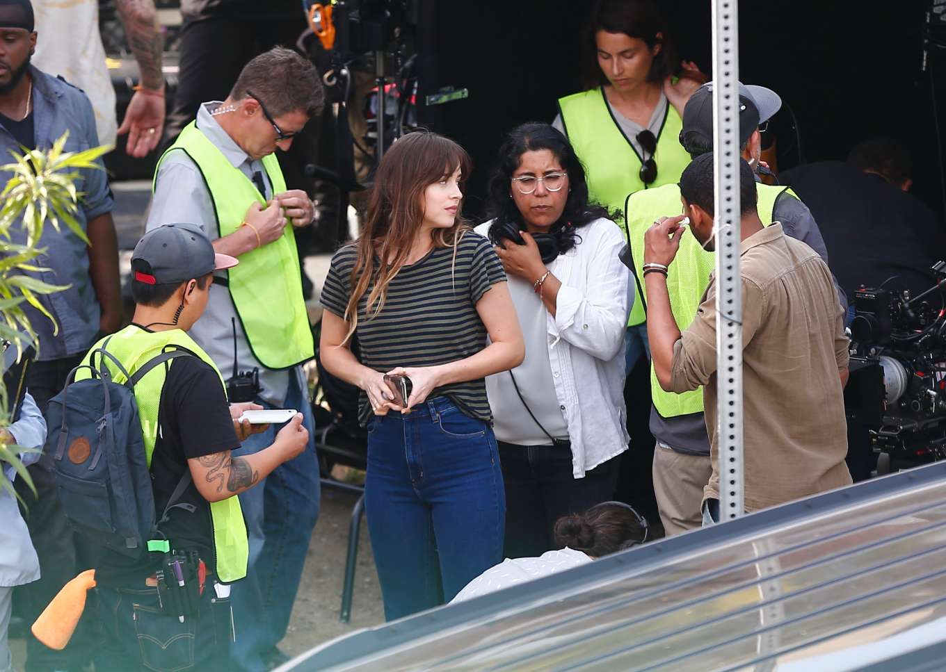 Dakota Johnson in Ripped Jeans â€“ Filming â€˜Coversâ€™ in Los Angeles